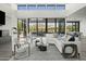 Spacious living room with golf course view and plenty of natural light at 37200 N Cave Creek Rd # 1009, Scottsdale, AZ 85262