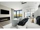 Bright Primary suite with fireplace, TV, and access to the outdoors at 37200 N Cave Creek Rd # 1009, Scottsdale, AZ 85262
