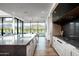Modern kitchen with sleek cabinetry, high-end appliances, and mountain views at 37200 N Cave Creek Rd # 1009, Scottsdale, AZ 85262
