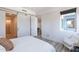 Bedroom with a queen bed and sliding barn doors at 3131 N Central Ave # 6021, Phoenix, AZ 85012