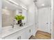 Clean bathroom with double vanity, modern lighting, and tile shower at 3131 N Central Ave # 5018, Phoenix, AZ 85012