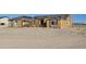 House under construction with wood framing visible at 1928 W Big Sky Ln, Queen Creek, AZ 85144
