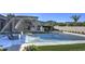 Luxury backyard oasis featuring a refreshing pool, water features, and comfortable lounge chairs at 6940 E Indian Bend Rd, Paradise Valley, AZ 85253
