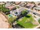 Aerial view showcasing the home, pool, and neighborhood at 1327 E Judi Dr, Casa Grande, AZ 85122