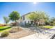 Two-story home with a front porch and well-maintained landscaping at 1327 E Judi Dr, Casa Grande, AZ 85122