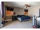 Comfortable bedroom with ceiling fan and ample natural light at 1327 E Judi Dr, Casa Grande, AZ 85122