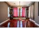 Elegant dining room with hardwood floors and large windows at 1327 E Judi Dr, Casa Grande, AZ 85122
