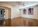 Second bedroom with ceiling fan and tile flooring at 1327 E Judi Dr, Casa Grande, AZ 85122