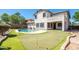 Relaxing backyard oasis with a pool and putting green at 1327 E Judi Dr, Casa Grande, AZ 85122