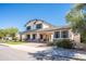 Two-story home with front porch and landscaping at 1327 E Judi Dr, Casa Grande, AZ 85122