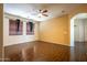 Bright living room featuring tile floors and ceiling fan at 1327 E Judi Dr, Casa Grande, AZ 85122