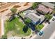 Aerial view showing home, pool, putting green, and surrounding area at 1327 E Judi Dr, Casa Grande, AZ 85122