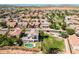 Aerial view of the house and surrounding neighborhood at 1327 E Judi Dr, Casa Grande, AZ 85122