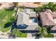 Aerial view of a large house with a pool and putting green at 1327 E Judi Dr, Casa Grande, AZ 85122