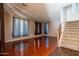 Bright living room with tile floors and staircase at 1327 E Judi Dr, Casa Grande, AZ 85122