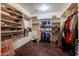 Large walk-in closet with shelving and hanging rods at 1327 E Judi Dr, Casa Grande, AZ 85122
