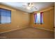 Spacious bedroom with carpet and ceiling fan at 1327 E Judi Dr, Casa Grande, AZ 85122
