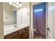 Clean bathroom with single vanity and shower/tub combo at 1327 E Judi Dr, Casa Grande, AZ 85122