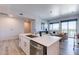 Modern kitchen with white cabinetry, stainless steel appliances, and island at 3131 N Central Ave # 3016, Phoenix, AZ 85012