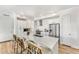 Modern kitchen with white shaker cabinets, stainless steel appliances, and an island at 3131 N Central Ave # 4012, Phoenix, AZ 85012