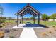 Park picnic area with shaded tables, grills, and a grassy area at 7583 W Gelding Dr, Peoria, AZ 85381