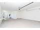 Attached garage with ample space and extra storage at 7583 W Gelding Dr, Peoria, AZ 85381