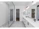 Spa-like bathroom with large shower and vanity at 7583 W Gelding Dr, Peoria, AZ 85381