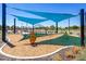 Modern playground with shade structures and fun equipment at 7583 W Gelding Dr, Peoria, AZ 85381