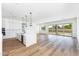 Open concept living room and kitchen area at 7583 W Gelding Dr, Peoria, AZ 85381