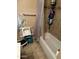 Clean bathroom with shower/tub combo and tiled floor at 3840 N 43 Ave # 50, Phoenix, AZ 85031