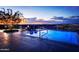 Rooftop pool with city views and comfortable lounge chairs at 7180 E Kierland Blvd # 1115, Scottsdale, AZ 85254