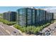 Aerial view of upscale building with city views and tree-lined streets at 7180 E Kierland Blvd # 1115, Scottsdale, AZ 85254