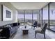 Sophisticated living room featuring floor-to-ceiling windows at 7180 E Kierland Blvd # 1115, Scottsdale, AZ 85254