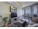 Living room with city views and balcony access at 7180 E Kierland Blvd # 1115, Scottsdale, AZ 85254