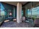 Private balcony with city views and comfortable patio furniture at 7180 E Kierland Blvd # 1115, Scottsdale, AZ 85254