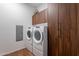 Convenient laundry room with washer, dryer, and ample storage at 7180 E Kierland Blvd # 1115, Scottsdale, AZ 85254