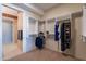 Large walk-in closet with ample shelving and hanging space at 7180 E Kierland Blvd # 1115, Scottsdale, AZ 85254