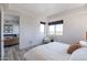 Bright bedroom with a king-size bed and access to another room at 3131 N Central Ave # 5021, Phoenix, AZ 85012