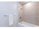 Small bathroom with shower/tub combo and neutral tile at 3131 N Central Ave # 5021, Phoenix, AZ 85012