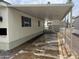 Mobile home with covered patio and walkway at 7300 N 51St Ave # 208, Glendale, AZ 85301