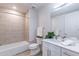 Modern bathroom with a bathtub, shower, and updated vanity at 3131 N Central Ave # 5013, Phoenix, AZ 85012