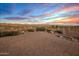 Gravel backyard with fire pit and mountain views at 11519 E Blue Wash Rd, Cave Creek, AZ 85331