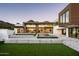 Backyard with a large pool and spa; steps down to grassy area at 6554 N 40Th Pl, Paradise Valley, AZ 85253