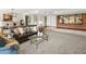 Spacious living room with a large window and comfortable seating at 7120 N Clearwater Pkwy, Paradise Valley, AZ 85253