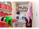 Laundry room with washer, dryer, and storage at 2 E Muriel Dr, Phoenix, AZ 85022