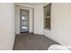 Bright entryway with gray door and tiled floor at 28210 N Crook Ct, Rio Verde, AZ 85263