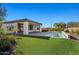 Inviting pool and patio area with lush landscaping at 28210 N Crook Ct, Rio Verde, AZ 85263