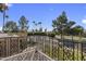 Balcony with wrought iron railing and treetop views at 8094 E Via Del Vencino --, Scottsdale, AZ 85258