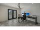 Modern home office with a large desk, computer, and built-in shelving at 8094 E Via Del Vencino --, Scottsdale, AZ 85258