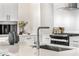 Modern kitchen features stainless steel appliances and a large island at 3131 N Central Ave # 3018, Phoenix, AZ 85012